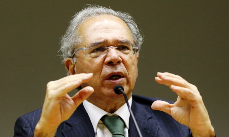 Dólar cai e bolsa reduz perdas após discurso do ministro da Economia